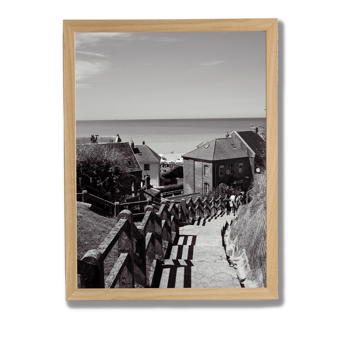 Tirage photo noir et blanc encadré de l'escalier de la plage de Mers-les-Bains, accroché sans percer
