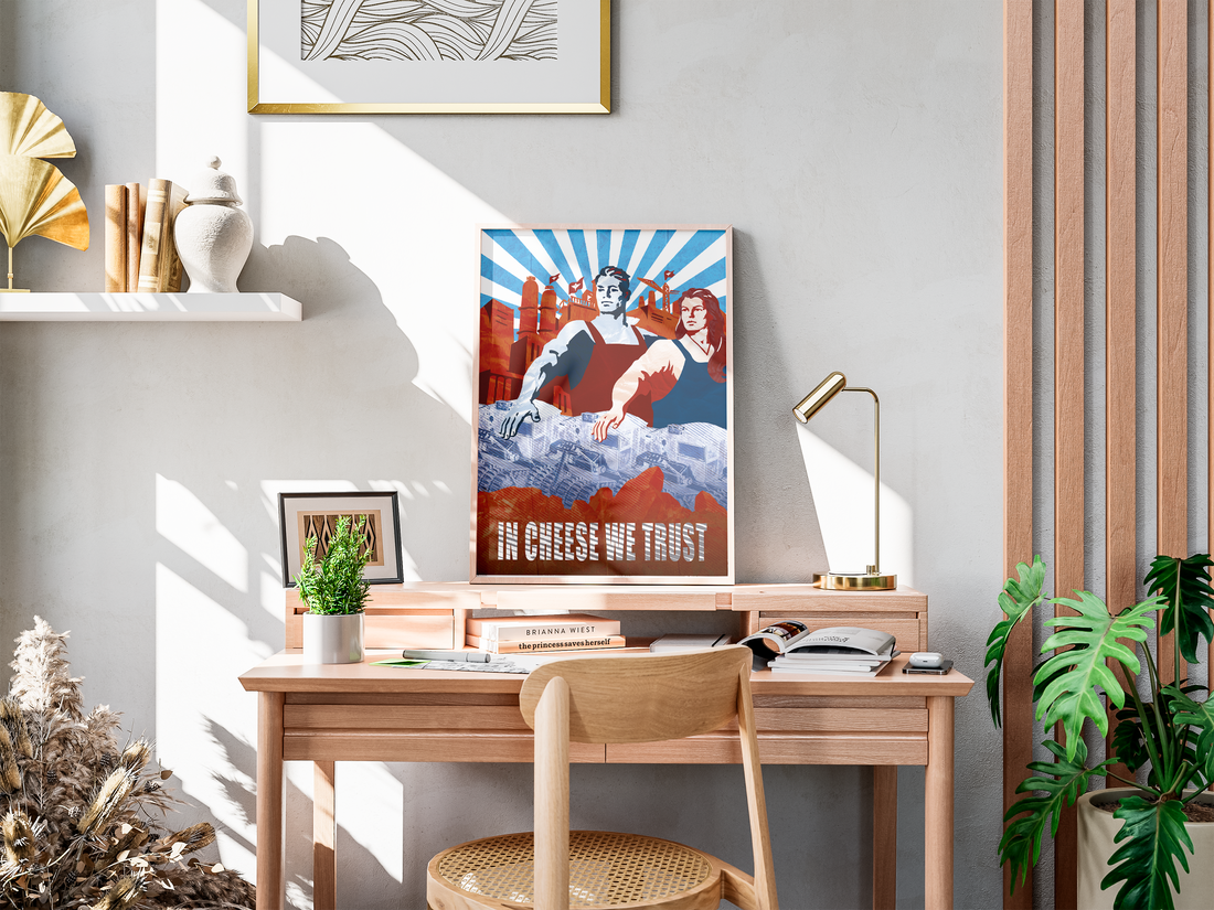 Poster illustré IN CHEESE WE TRUST posé sur un bureau, affiche retro gaming grand format dessinée par AristanT_ - Corentin GMT